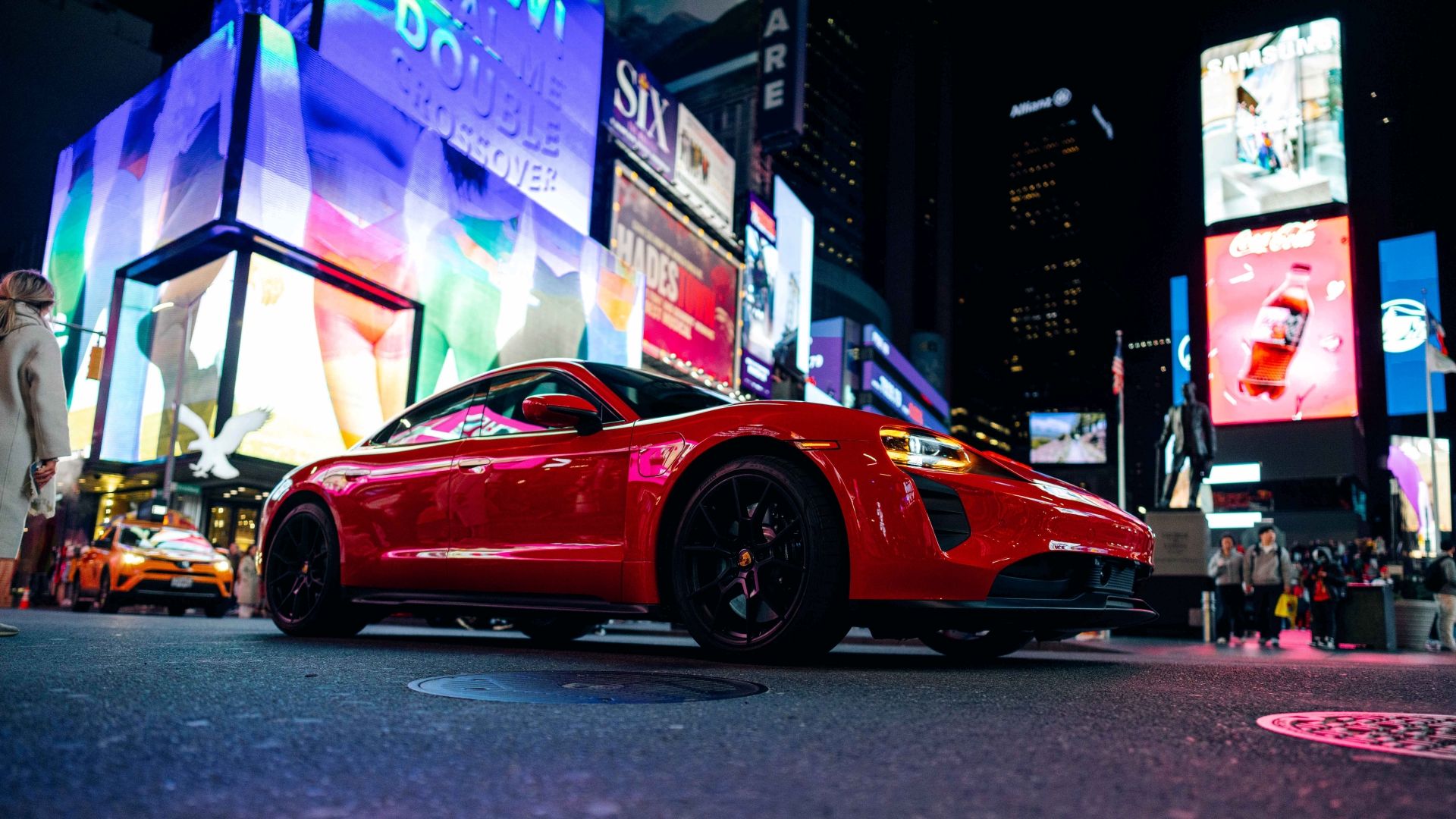2023 Porsche Taycan GTS on the streets of New York at night.
