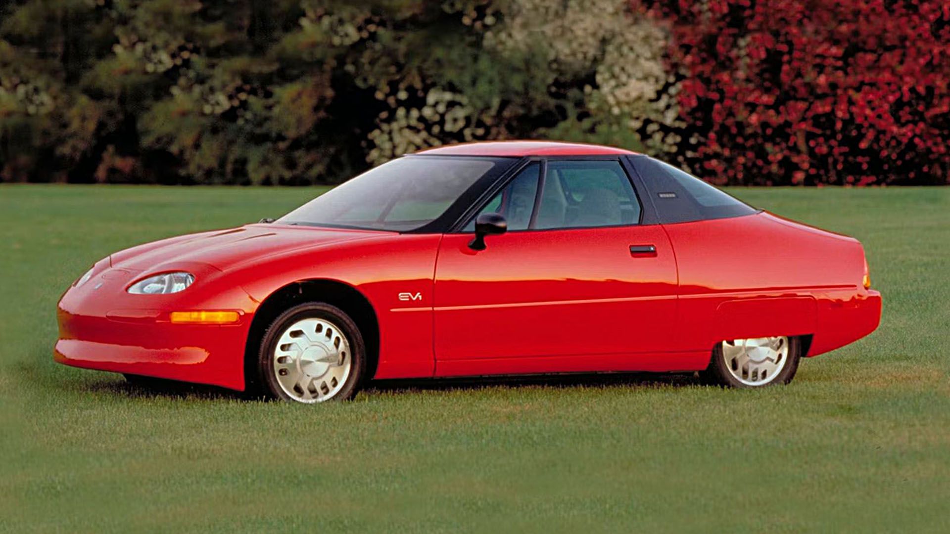 Profile view of a red GM EV1