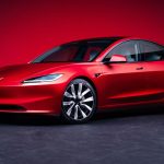 Red Tesla Model 3 front-quarter